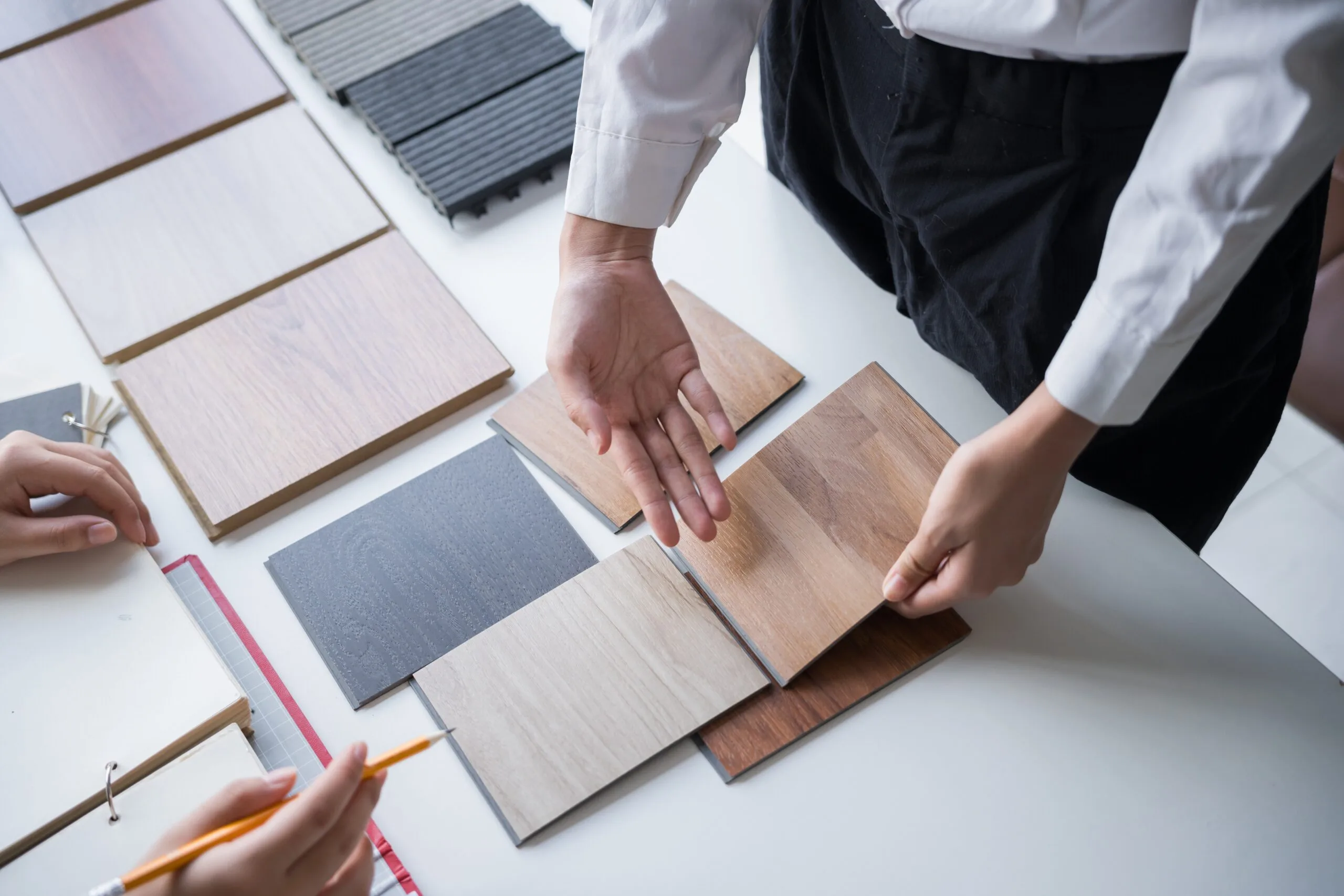 Client,And,Interior,Designer,Selecting,Materials,For,Home,Decoration,In