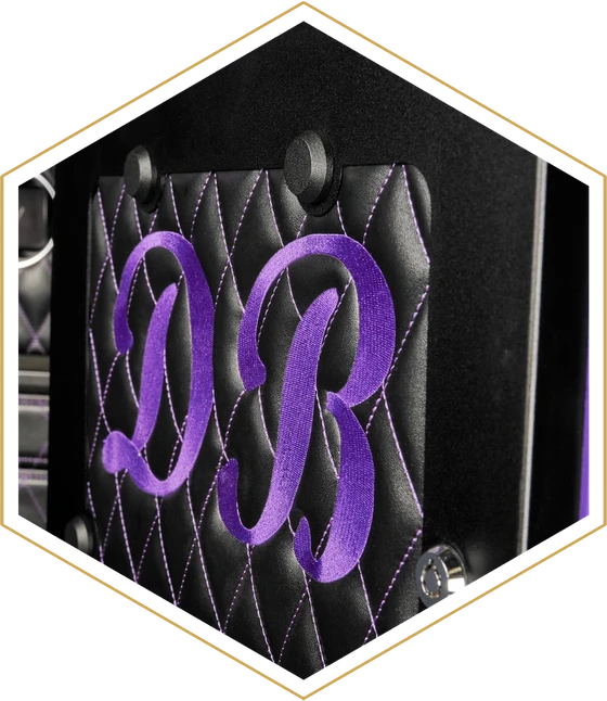 Diamond-stitched leather door panel with custom monogram embroidery