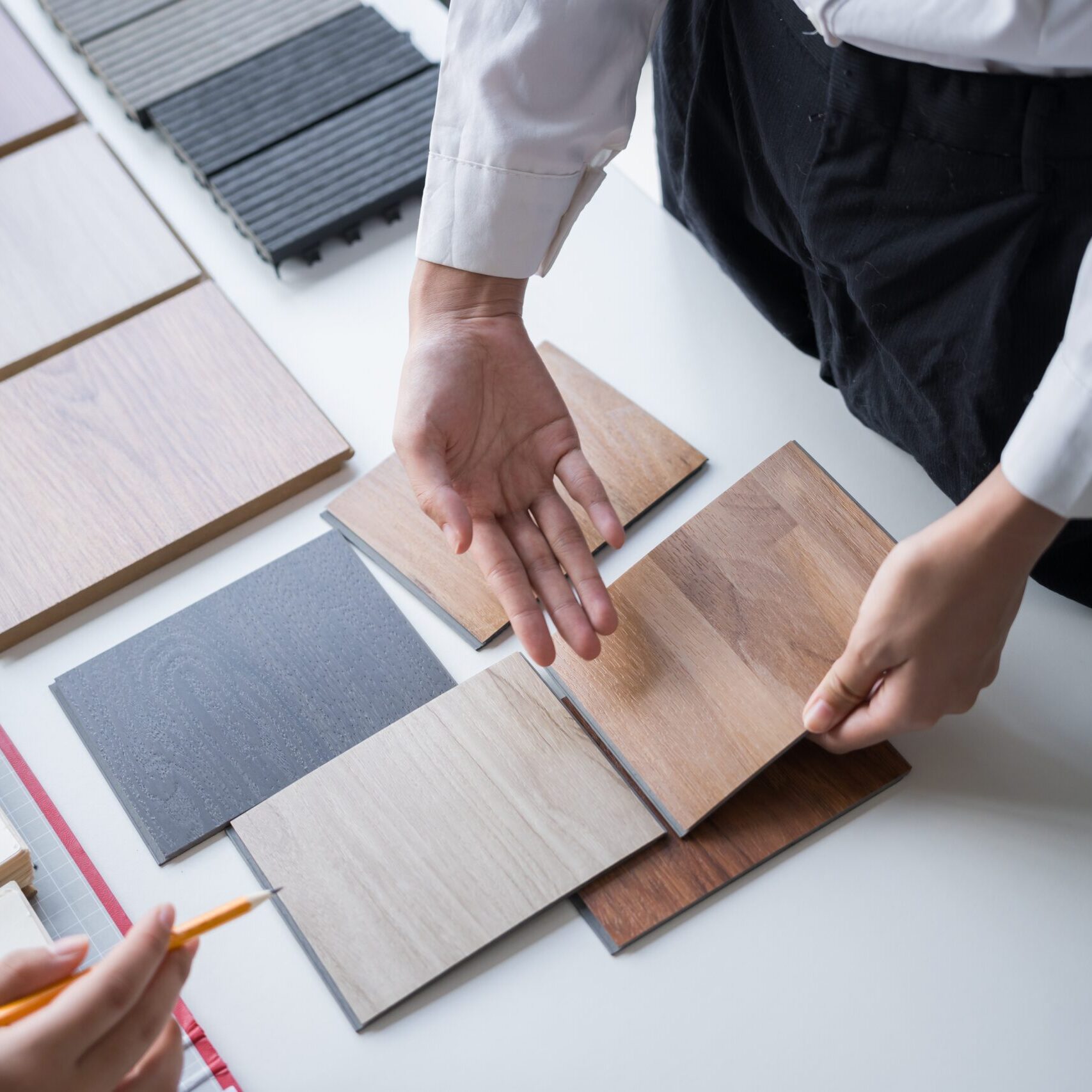 Client,And,Interior,Designer,Selecting,Materials,For,Home,Decoration,In
